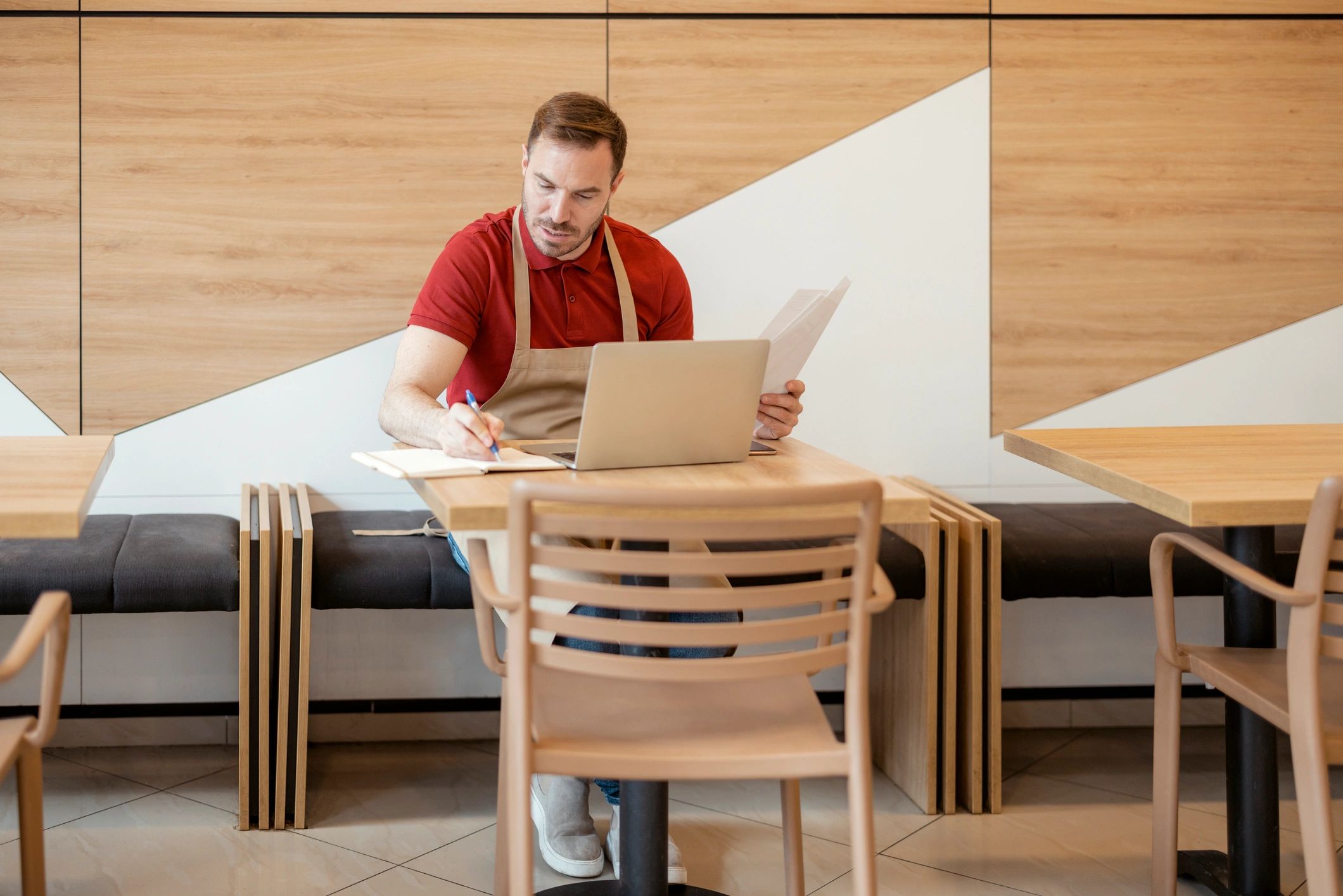 Business owner reviewing financial paperwork